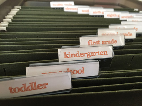 A great way to create a school memory box and organize kids school papers once and for all-- from their toddler years through twelfth grade! What a great school keepsake to pass on to kids too!